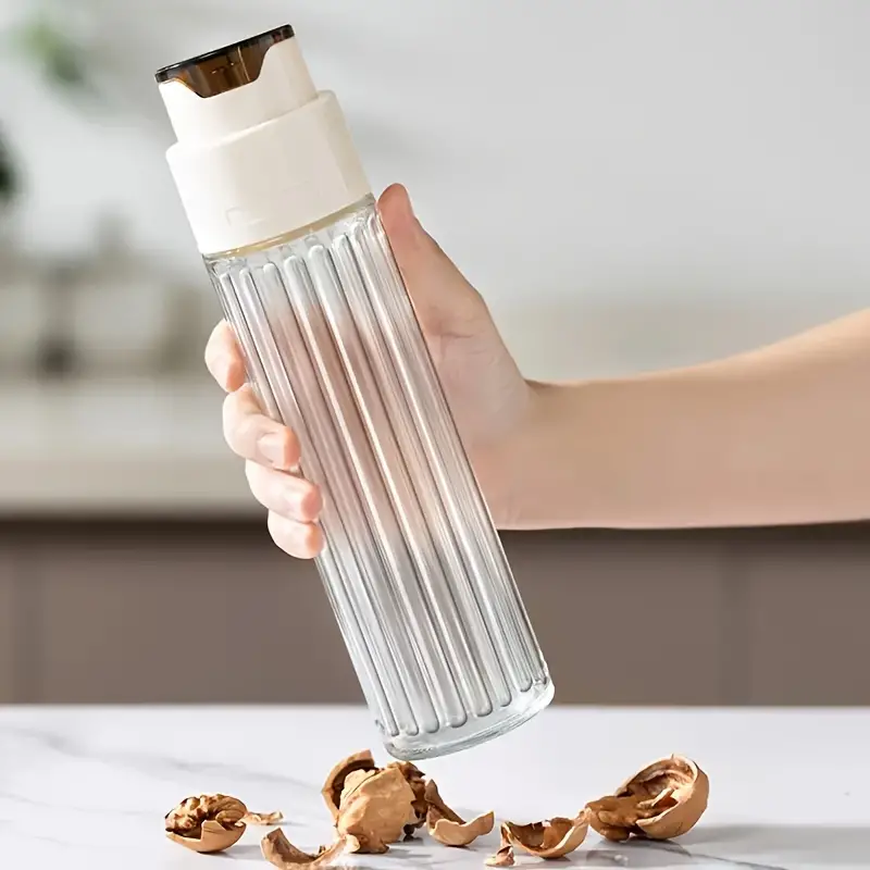 1Pcs Automatic Opening And Closing Oil Glass Bottle (Premium Quality)